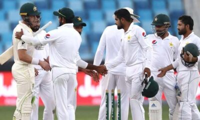 Pakistan Test squad greeting Aussie players after an innings